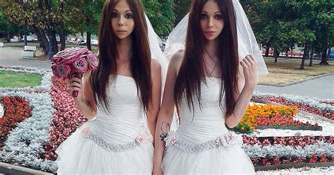 identical bride and groom both wear wedding dresses for russia s most controversial marriage