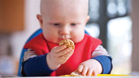 weaning experts share  simple tips    baby eating solid food heart