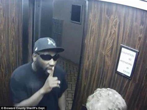 elderly woman is trapped in elevator with knife wielding robber after door shuts as he tries to