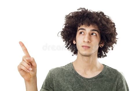 smiling young man pointing  stock image image  presenting face