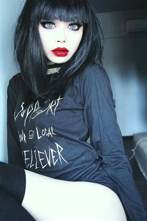 black hair pale skin red lips i don t know who this is but damn