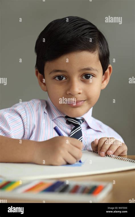 boy coloring   book stock photo alamy