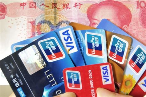 china    pledge  open  market  foreign credit card firms sources claim south