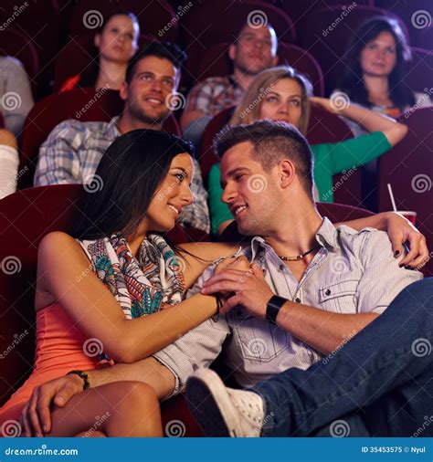 loving couple embracing in cinema stock image image of female