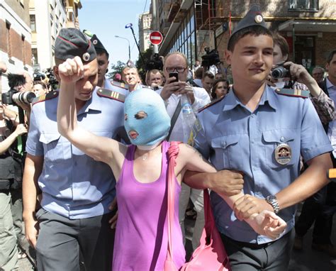 A Supporter Of The Female Punk Band “pussy Riot” Is Detained By Police