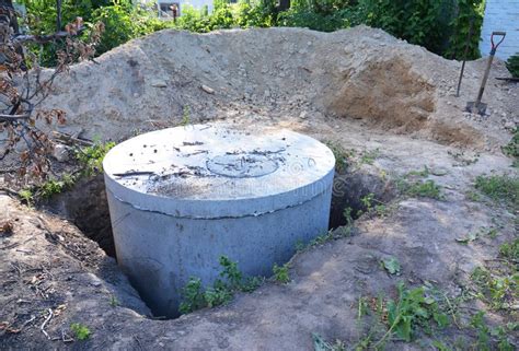 Manhole Cover Installation With Sewer Tank Outdoors Stock