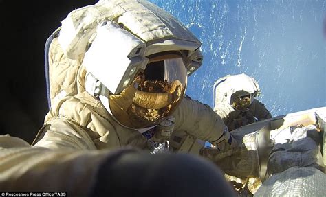 russian cosmonauts break record for longest space walk daily mail online