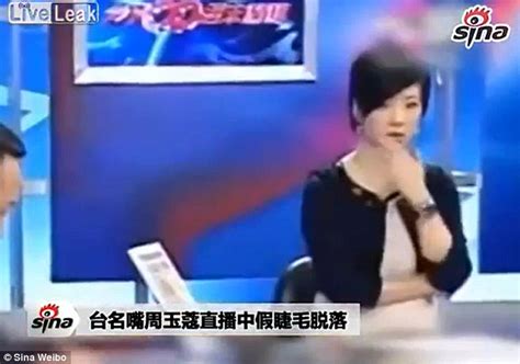 Chinese Reporter Keeps Talking As Her False Eyelashes Come Unstuck