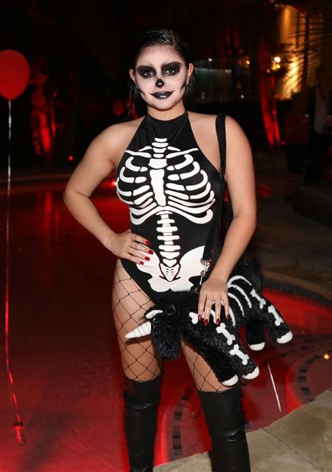 ariel winter heats up halloween in some seriously sexy