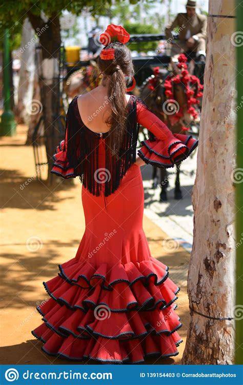 the beautiful attractive girl in the red flamenco dress stock image