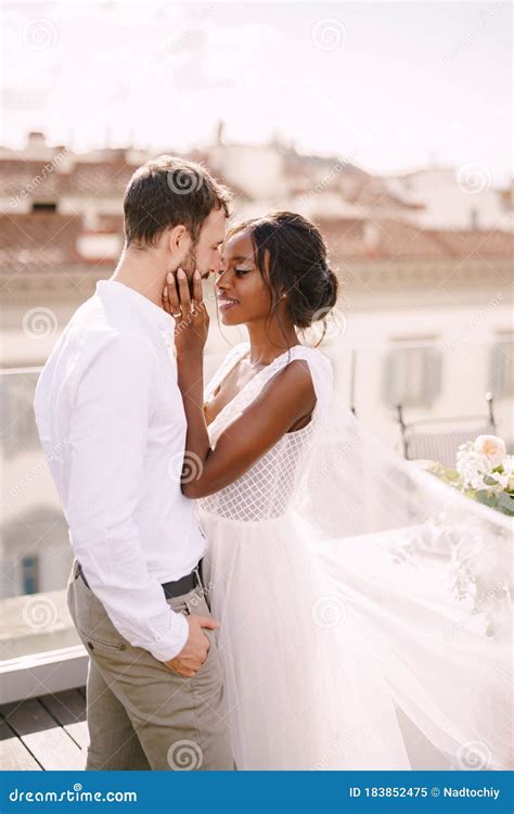 mixed race wedding couple caucasian groom and african american bride