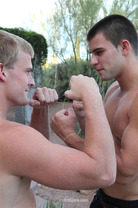 two horny college jocks get to stroke their erected penises side by side