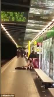 shocking moment barcelona couple have sex on the platform of a busy tube station daily mail online