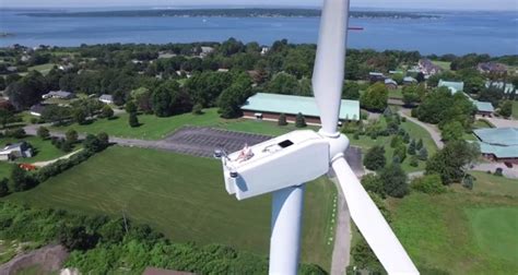 drone captures man sunbathing  wind turbine eyeondronescom