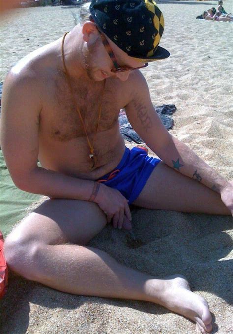 sexy hairy chested guy caught pissing at the beach