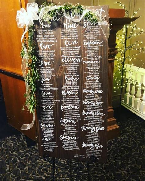 Tall Wooden Wedding Seating Chart Unconventional Seating Charts From
