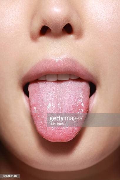 Female Sticking Out Tongue Close Up Bildbanksfoton Och Bilder Getty