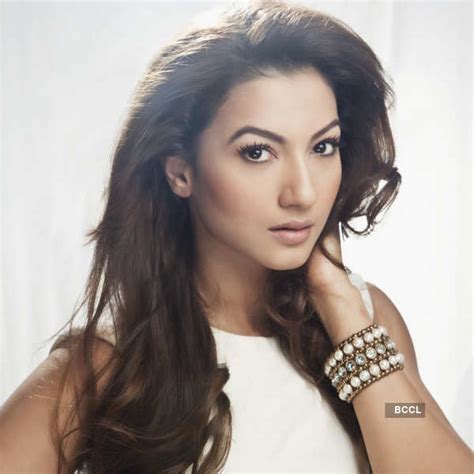 gauhar khan looks hot in a black two piece during a photoshoot