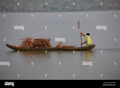 boatman carrying goods   boat stock photo alamy
