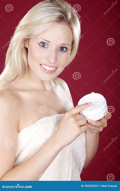 Beautiful Blond Model At Wellness Massage In Red And White Design Stock