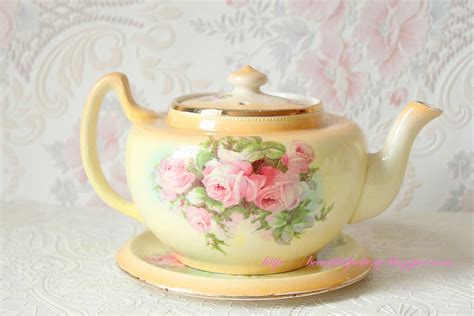 beautiful pottery vintage teapot  stand