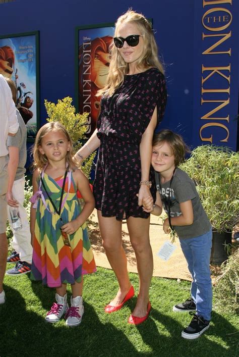 celebrity families attend the premiere of disney s the