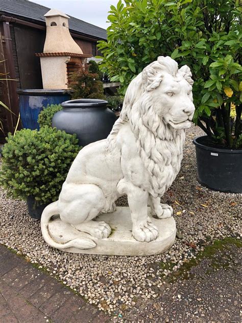 majestic lion statues pair  pot place garden centre