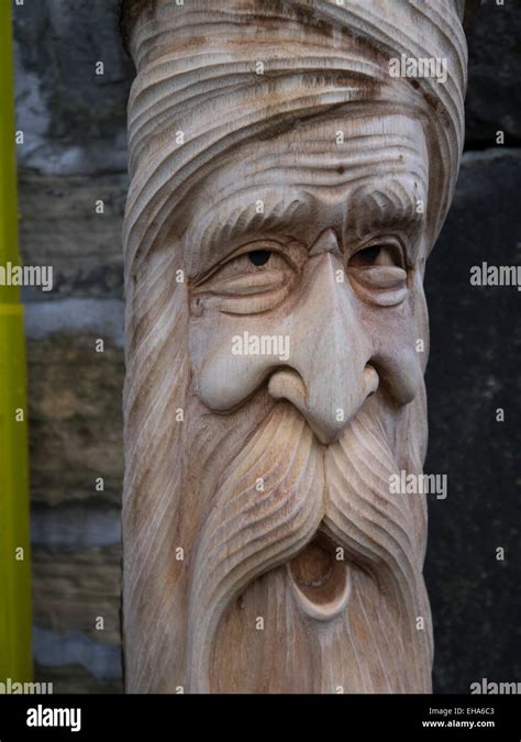 carvings  wood spirit faces stock photo alamy