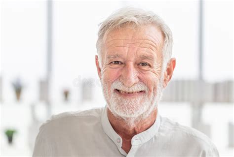 Portrait Of Happy Senior Man Looking At Camera Smiling Elderly