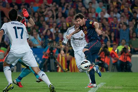 Lionel Messi Of Fc Barcelona Scores His Team S First Goal