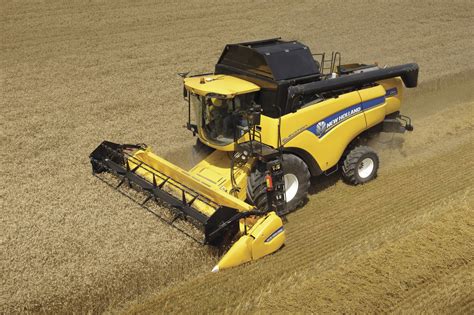 combine  holland combine harvesters farm machinery harvesting
