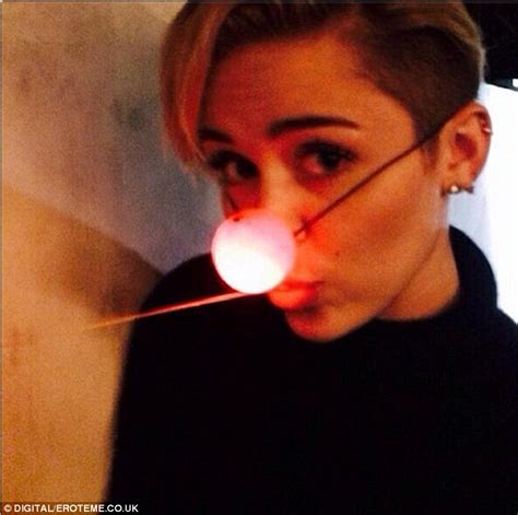 Miley Cyrus Puts Her Clothes Back On As She Posts Innocent Rudolph