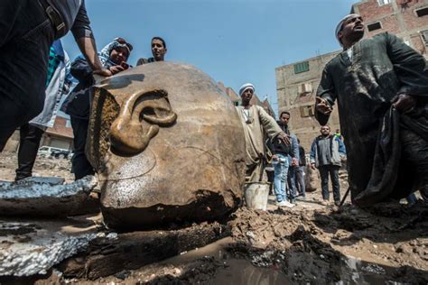 giant ancient egyptian pharaoh statue found underneath cairo slum
