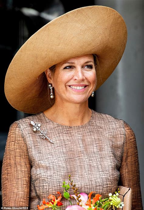 Queen Of The Netherlands Beams In Nude Outfit As She Visits A Eco