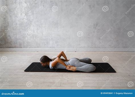 woman practicing advanced yoga  series  yoga poses stock image