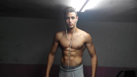 awsome aesthetic teen flexing 6 pack abs ripped