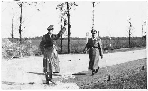 Two Ss Officers Greet Each Other In The Dachau
