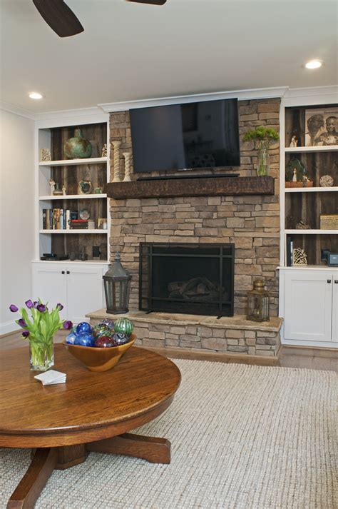 stone fireplace  bookshelves   side