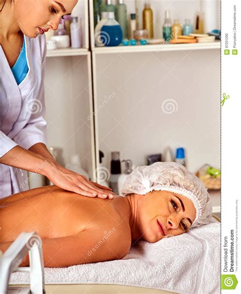 massage therapy deals woman therapist making manual therapy back