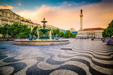 rossio square colorful   happen  visit rossio square  lisbon portugal