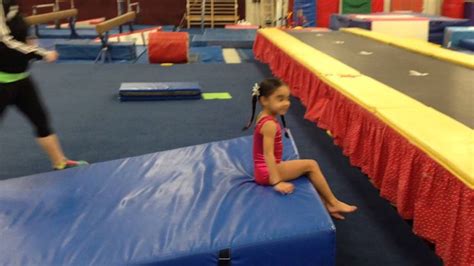 preschool gymnastics backward roll back roll from side tramp onto tramp coaching gym