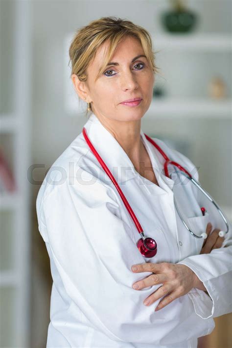 Portrait Of Middle Aged Female Doctor Stock Image Colourbox