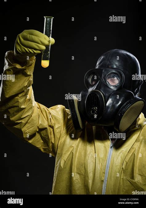 man  gas mask  hazmat suit stock photo alamy