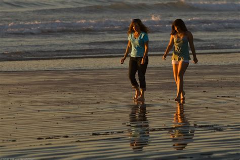 a mother daughter team presumably walk barefoot together