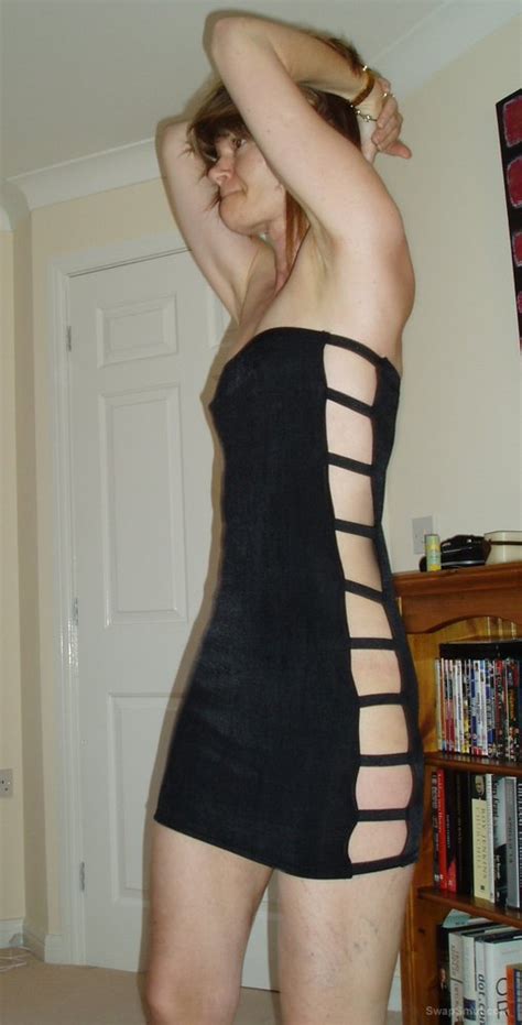 cheating wife dressed in a revealing dress