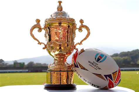 presenting  rugby world cup trophy   handed