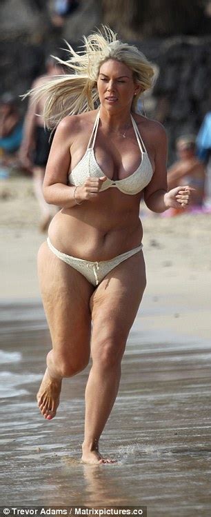 Frankie Essex Wears A White Bikini During Beach Break In