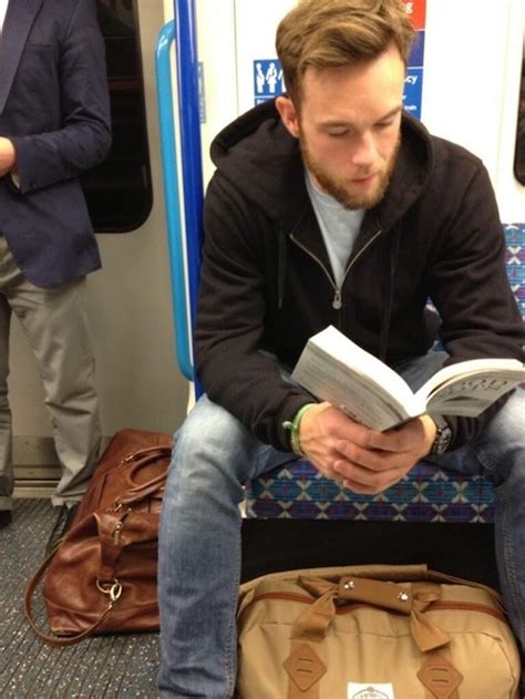 hot guys reading books on public transportation