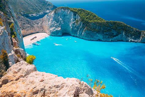beautiful greek islands   visit hand luggage  travel food photography blog