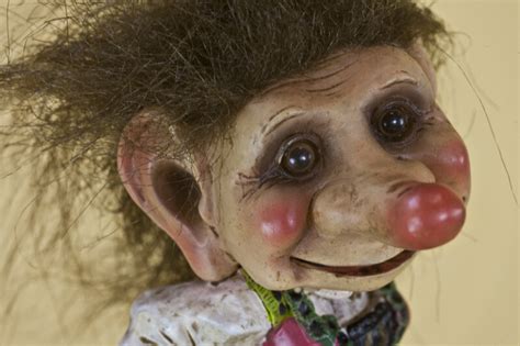 norway female troll doll with marble like eyes close up clippix etc